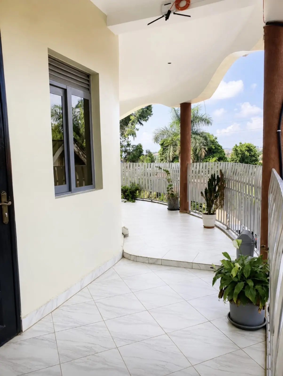Outdoor corridor seating at NOAZ Hotel Kampala